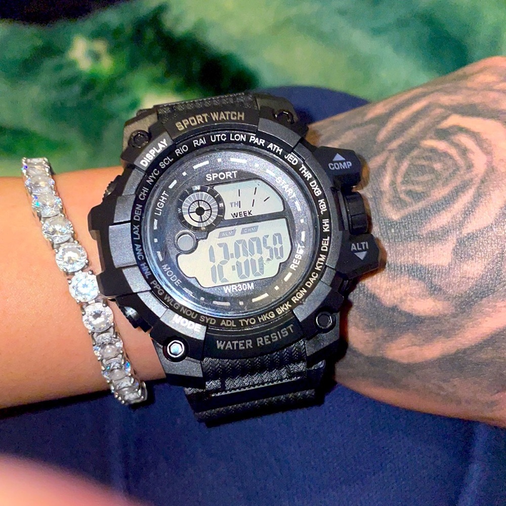 Sports watch black in color